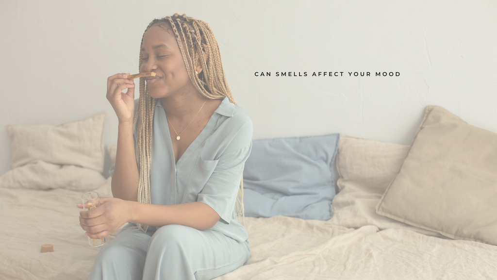 woman smelling cinnamon stick and smiling improves mood